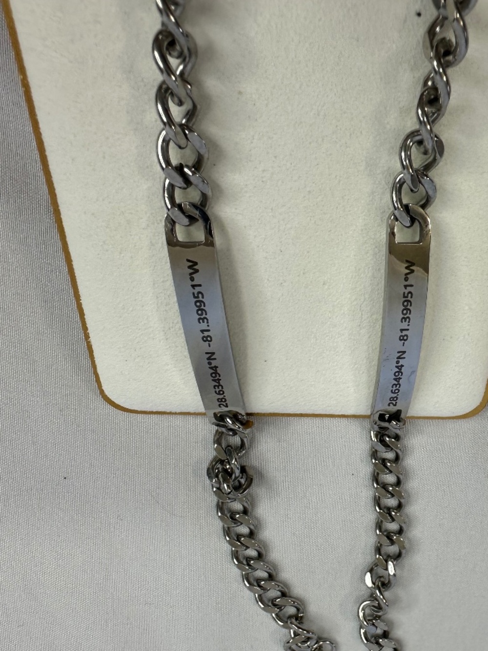 Two Stainless Steel Bracelets Engraved Latitude and Longitude of Disney World.
